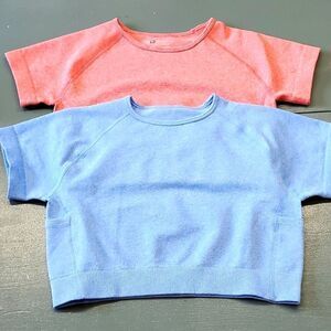 Lot of 2 spandex tops. One blue on redish pink. NWOT. BOTH ARE SIZE MEDI…